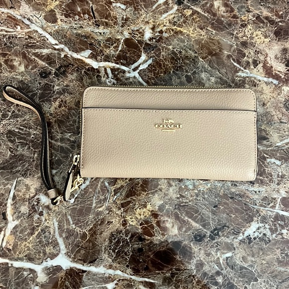 Coach Handbags - NWT Hard to find color Coach Accordion Zip Wallet with Wristlet strap